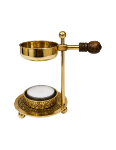 Golden brass incense burner with wooden handle and decorative base